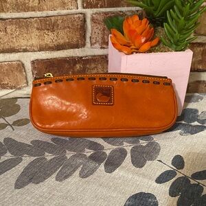 Dooney & Bourke Tangerine Florentine pouch Euc